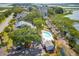 Aerial shot showcasing the community pool, homes, and the picturesque canal and waterway at 1621 Folly Creek Way # D-8, Charleston, SC 29412