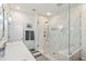 Luxurious bathroom with a glass-enclosed shower, modern fixtures, marble tile, and a bright, clean aesthetic at 1621 Folly Creek Way # D-8, Charleston, SC 29412