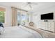 This main bedroom features balcony access, light-filled interiors, modern decor, and a bright airy feel at 1621 Folly Creek Way # D-8, Charleston, SC 29412