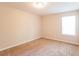 Comfortable bedroom features neutral carpet, trim, and a sunlit window at 167 Meadow Wood Rd, Summerville, SC 29486