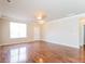 Bright, expansive living room with hardwood floors and ample space for entertaining at 167 Meadow Wood Rd, Summerville, SC 29486