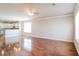 Spacious living room featuring gleaming hardwood floors, neutral walls, and abundant natural light at 167 Meadow Wood Rd, Summerville, SC 29486
