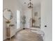 Bright entryway with wood floors, decorative furnishings, and a welcoming ambiance at 1894 Brittlebush Ln, Johns Island, SC 29455