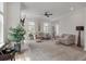 Inviting living room with a plush rug, comfortable sofas, and stylish decor at 1894 Brittlebush Ln, Johns Island, SC 29455
