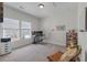 Bright home office with natural light, a modern desk setup, and neutral decor for a productive workspace at 1894 Brittlebush Ln, Johns Island, SC 29455
