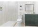 A stylish bathroom with a walk-in shower, vanity and artwork adds charm at 2020 Piper Dr, Charleston, SC 29407