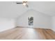 A bright room with a vaulted ceiling and laminate flooring throughout at 2020 Piper Dr, Charleston, SC 29407