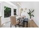 Bright dining room with large windows and modern decor at 2020 Piper Dr, Charleston, SC 29407