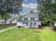 Beautiful two-story home boasting a spacious yard, a covered front porch, and traditional curb appeal at 2020 Piper Dr, Charleston, SC 29407