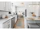 Well-lit kitchen featuring stainless steel appliances and granite countertops at 2020 Piper Dr, Charleston, SC 29407