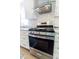 Stainless steel oven and range with white cabinets in a modern kitchen at 2020 Piper Dr, Charleston, SC 29407