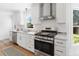 Modern kitchen with stainless steel oven, range, and tiled backsplash at 2020 Piper Dr, Charleston, SC 29407