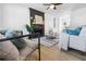 Cozy living room with a fireplace, hardwood floors, and neutral decor at 2020 Piper Dr, Charleston, SC 29407