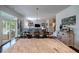 Bright, open-concept living area featuring a dining table and a cozy seating area at 2024 Lanneau Ln, Johns Island, SC 29455