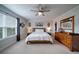 Serene main bedroom features a large window, a comfortable bed, and neutral decor at 2024 Lanneau Ln, Johns Island, SC 29455