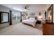Spacious main bedroom boasts a large window, neutral colors, and ample closet space at 2024 Lanneau Ln, Johns Island, SC 29455