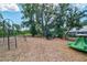 Community playground with slides and climbing equipment in a park-like setting at 2024 Lanneau Ln, Johns Island, SC 29455