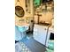 Laundry room featuring updated washer and dryer, utility sink, and tiled flooring at 2066 Wappoo Dr, Charleston, SC 29412