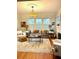 Cozy living room boasts hardwood floors, natural light, and stylish furniture at 2066 Wappoo Dr, Charleston, SC 29412