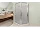 Bathroom with a corner shower and views into the Main Bedroom at 207 Littlejohn St, Summerville, SC 29483
