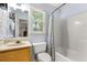 Bathroom with a shower/bathtub combination and a window at 207 Littlejohn St, Summerville, SC 29483