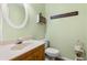 Comfortable powder room features soft green walls at 207 Littlejohn St, Summerville, SC 29483