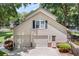 Attached two-car garage with a well-maintained driveway and landscaped surroundings at 207 Littlejohn St, Summerville, SC 29483