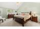 Spacious main bedroom featuring a vaulted ceiling, ceiling fan and two windows at 207 Littlejohn St, Summerville, SC 29483