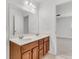 Bathroom featuring double sink vanity and large mirror at 210 Wildberry Ln, Goose Creek, SC 29445