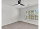 Bedroom with carpet, ceiling fan, plantation shutters, and neutral paint at 210 Wildberry Ln, Goose Creek, SC 29445