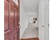 Bright entryway showcasing neutral carpeting and a view into the living spaces at 210 Wildberry Ln, Goose Creek, SC 29445