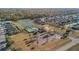 Aerial view of neighborhood, showing community pool, playground, lake, and clubhouse at 2106 Clipstone Dr, Ladson, SC 29456