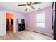 This charming bedroom features a ceiling fan, a window, and a closet, offering a serene and inviting space at 2106 Clipstone Dr, Ladson, SC 29456