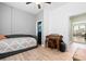 Bedroom with gray walls and wood-look floors featuring a daybed, an organ, and a closet at 2106 Clipstone Dr, Ladson, SC 29456