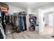 Spacious walk-in closet with ample shelving and hanging space for optimal organization at 2106 Clipstone Dr, Ladson, SC 29456
