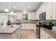 Charming kitchen offering stainless appliances, granite counters, and ample cabinet space at 2106 Clipstone Dr, Ladson, SC 29456