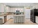 Well-appointed kitchen features ample counter space, stainless steel appliances, and modern finishes at 2106 Clipstone Dr, Ladson, SC 29456