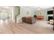 Inviting living room with fireplace, neutral tones, and views to entry and staircase at 2106 Clipstone Dr, Ladson, SC 29456
