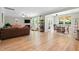 Spacious living room, dining area featuring hardwood floors, natural light and easy access to kitchen at 2106 Clipstone Dr, Ladson, SC 29456
