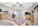 This spacious main bedroom features generous dressers and storage options, with en-suite bath access at 2106 Clipstone Dr, Ladson, SC 29456