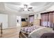 This main bedroom features tray ceiling, neutral walls, updated flooring, and an attached bath at 2106 Clipstone Dr, Ladson, SC 29456
