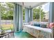 A relaxing porch with a swinging bed and curtains at 2106 Clipstone Dr, Ladson, SC 29456