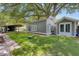 Spacious backyard with multiple outbuildings, offering plenty of room for storage and recreation at 216 Freeman St, Mount Pleasant, SC 29464