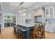 Spacious kitchen with a large center island, custom cabinets, and modern appliances at 216 Freeman St, Mount Pleasant, SC 29464