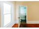 Bedroom with shiny hard wood floors and a view into the bathroom at 21877 Lowcountry Hwy, Ruffin, SC 29475