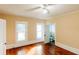 Bedroom with shiny hard wood floors and a view into the bathroom at 21877 Lowcountry Hwy, Ruffin, SC 29475