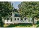 Exterior view of the house surrounded by lush greenery at 21877 Lowcountry Hwy, Ruffin, SC 29475