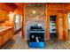 Spacious kitchen area features a brick accent wall with an electric stove at 21877 Lowcountry Hwy, Ruffin, SC 29475