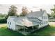 Rear exterior showcasing the metal roof and a convenient covered parking area at 21877 Lowcountry Hwy, Ruffin, SC 29475