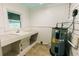 Clean utility room features a utility sink and water heater at 21877 Lowcountry Hwy, Ruffin, SC 29475